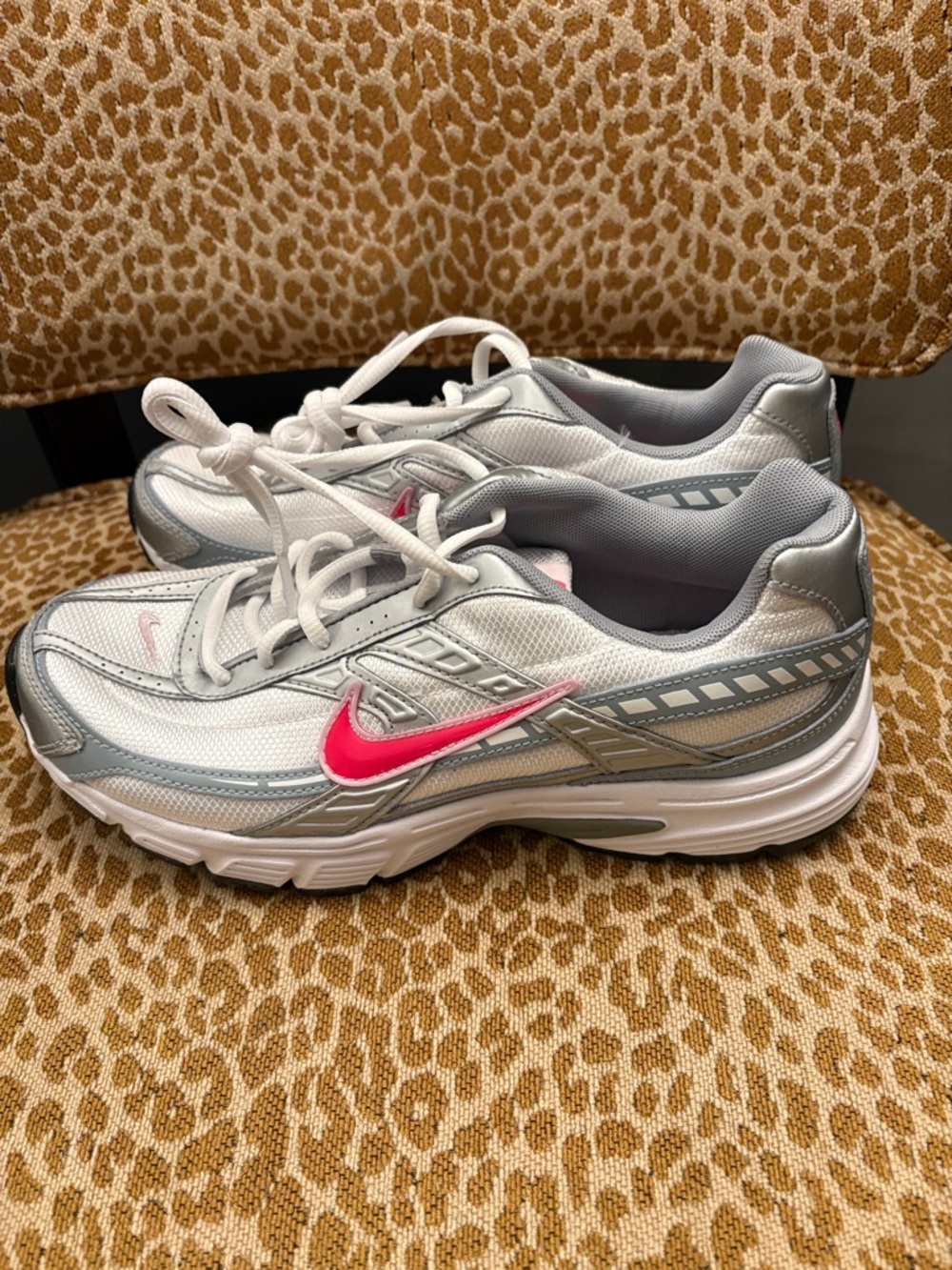 Nike Women’s Silver Sneakers with Pink Swoosh